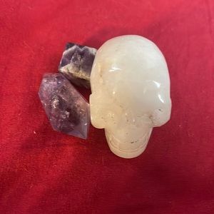 Large rose quartz skull with 2 amethyst pieces
